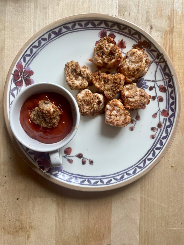 image of homemade chicken nuggets and ketchup on a plate