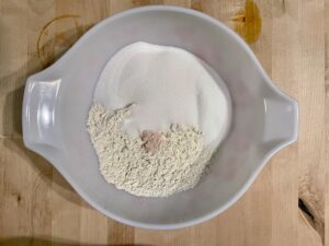 Flour, salt, and sugar in mixing bowl