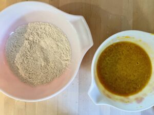 pumpkin bar dry ingredients and wet ingredients in separate mixing bowls