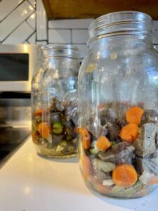 Homemade beef stew in jars