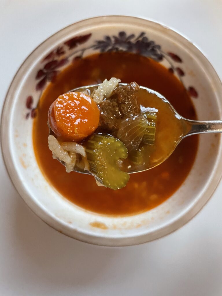 image of homemade beef stew served with rice