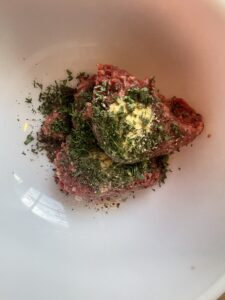 spices and herbs added to ground beef for beef breakfast sausage